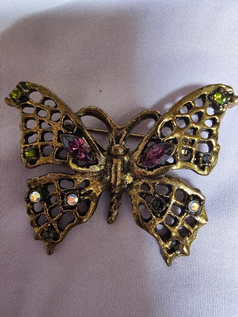 Vintage Gold-tone Filigree Butterfly Brooch with Purple and Green Rhinestones